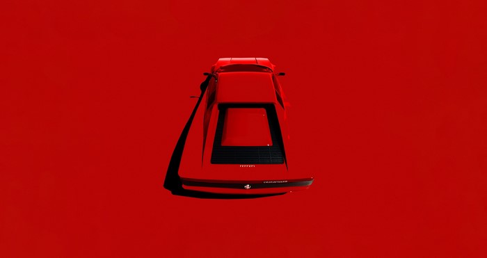 Red Ferrari car from a top-down view