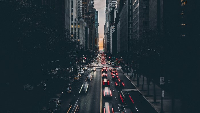 City street with traffic at dusk