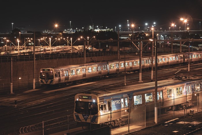 Trains at a railway yard at night