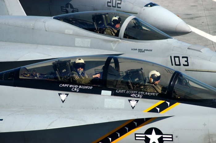 Two Boeing F/A-18E/F Super Hornets on an aircraft carrier