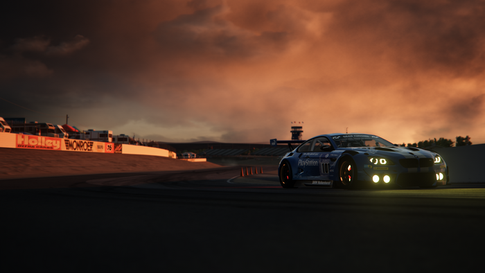 BMW M6 GT3 on a race track at sunset