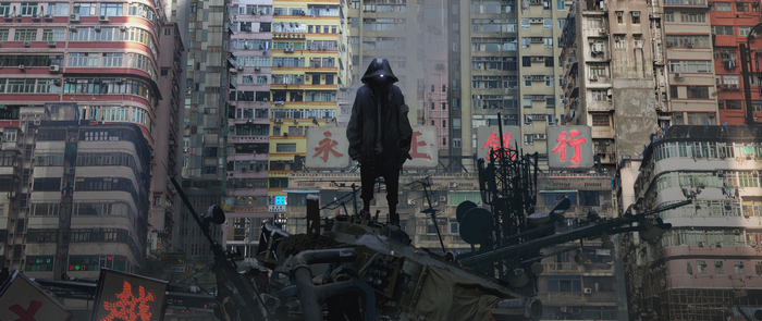 Figure in a hooded jacket standing on ruins in a city