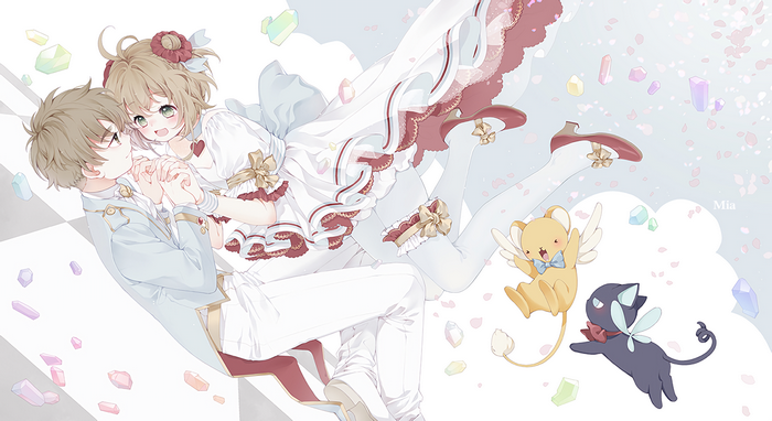 Couple in wedding attire with Kero and Suppi
