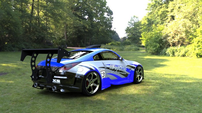Nissan 350Z with large rear spoiler on grass