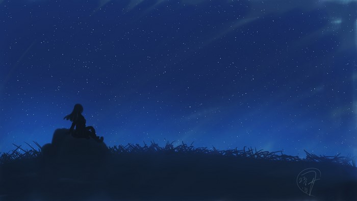 Silhouette of a woman sitting on rocks under a starry night sky