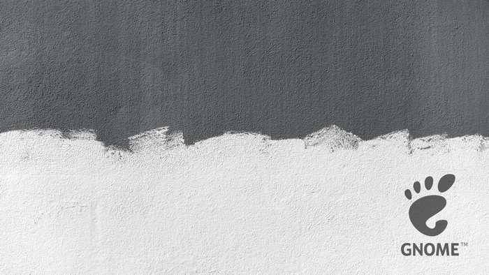 GNOME logo on a textured wall