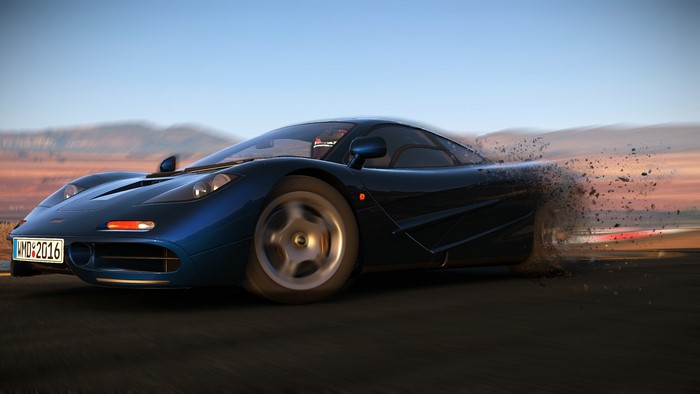 Blue McLaren F1 car with license plate WMD:2016