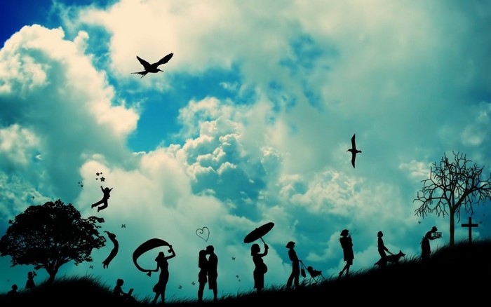 Silhouettes of people and animals against a cloudy sky