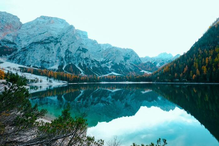 4K Mountains and Calm Waters Reflection