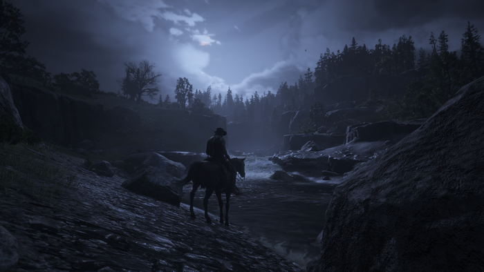Red Dead Redemption 2 night scene with a man on horseback