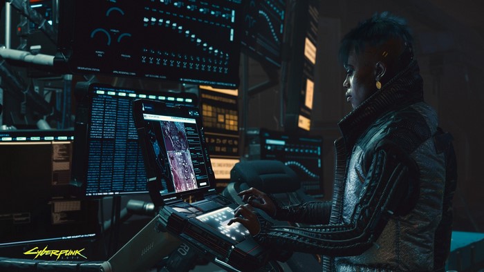 Woman working at computer in Cyberpunk 2077