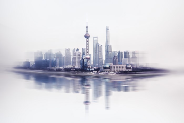 Shanghai skyline with Oriental Pearl Tower and reflections