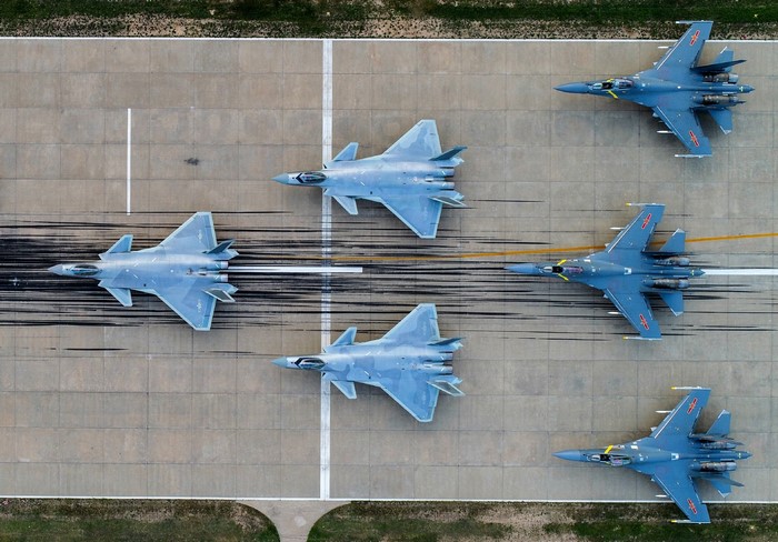 Chinese J-20 and J-16 fighter jets on runway