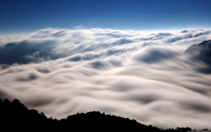 Sea of Clouds Over Mountains