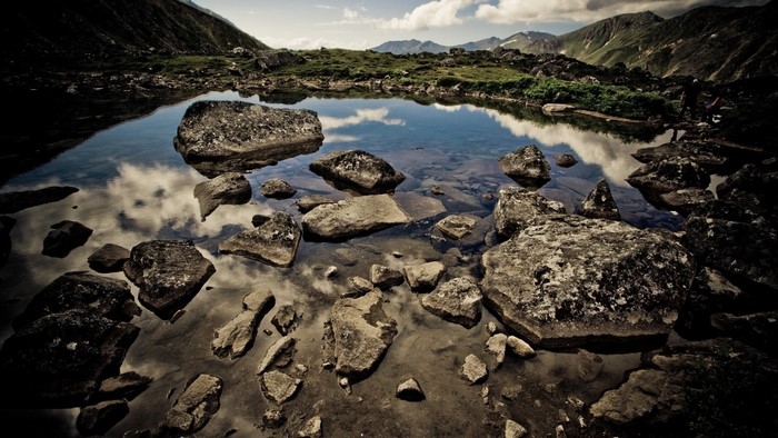 Rocky mountain lake with reflections