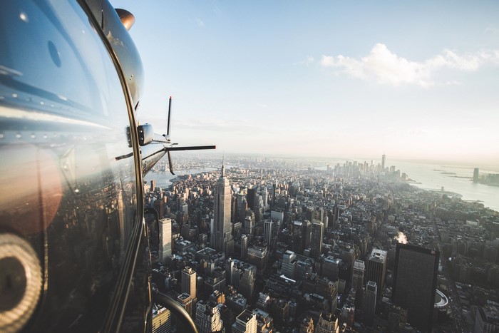 Helicopter flying over New York City skyline