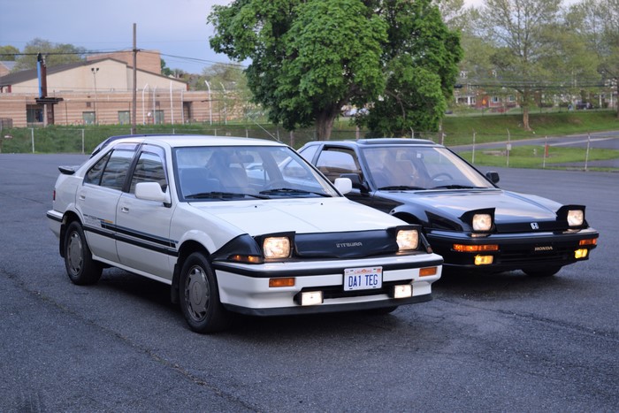 Two 1980s Honda Preludes with pop-up headlights