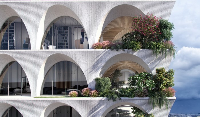 Modern architecture with arched balconies and greenery