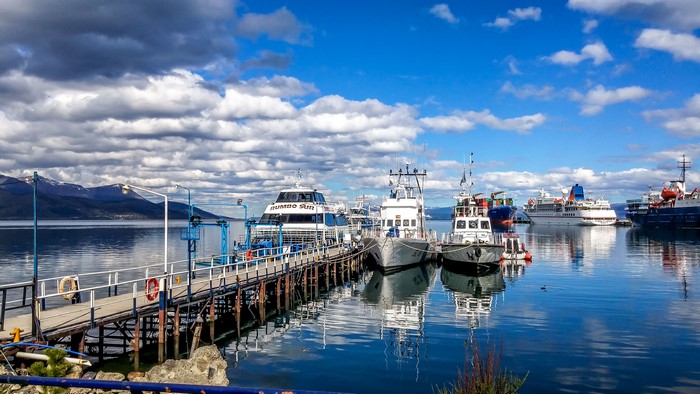 Boats docked at a pier in Ushuaia, Patagonia