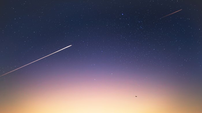 4K Starry Night Sky with Airplane Contrails