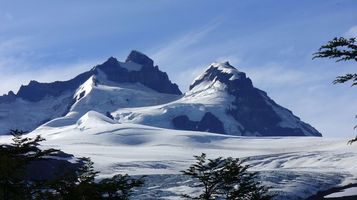 Snowy mountain peaks in Patagonia under a blue sky