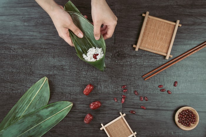 Making Zongzi with rice and dates