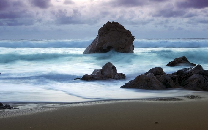 Waves crashing on rocks at a beach