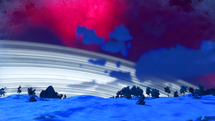 Alien planet with rings and blue landscape
