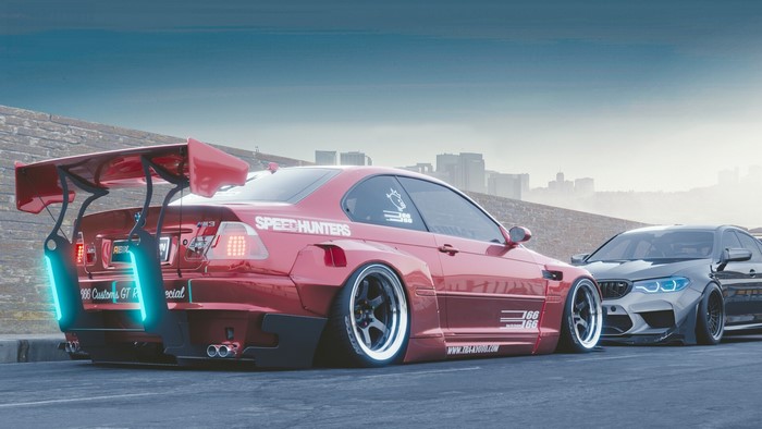 Modified red BMW M3 and grey BMW M5