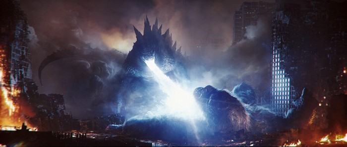 Godzilla and King Kong battling in a destroyed city