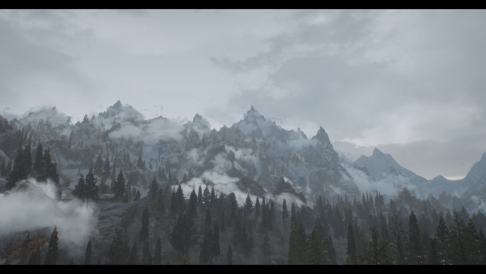 The Elder Scrolls V: Skyrim mountains with fog and trees