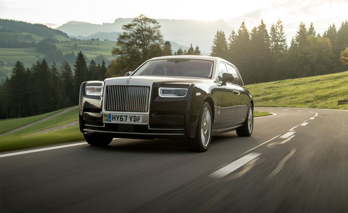 Rolls-Royce Phantom driving on a winding road