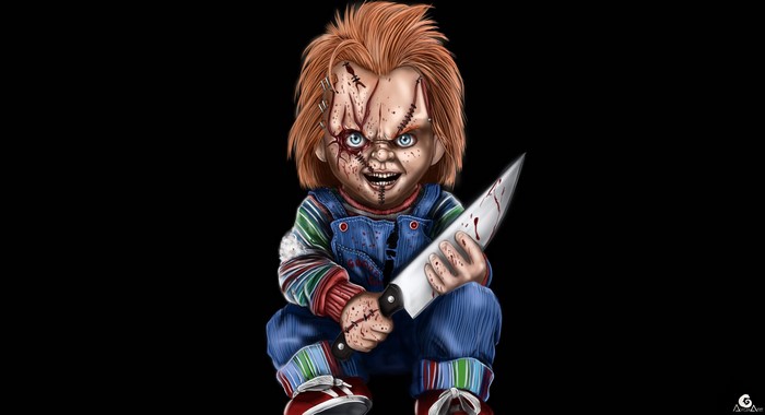 Chucky holding a bloody knife