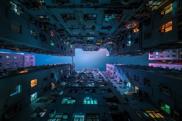 Hong Kong apartment buildings from below at night