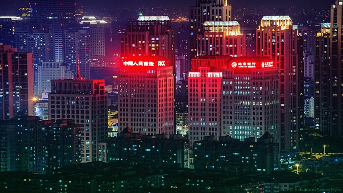 4K Cityscape with Illuminated Skyscrapers at Night