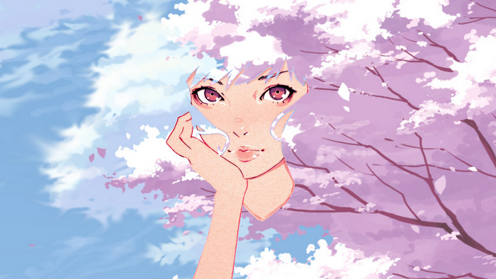 Girl with hand on face among cherry blossoms