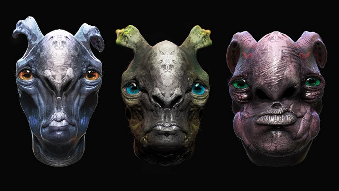 Three alien creature heads on black background