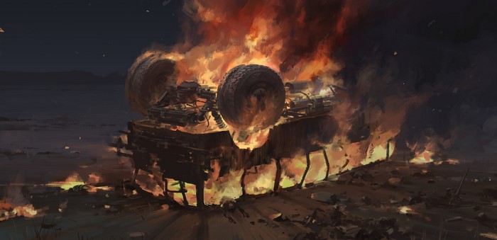 Car engulfed in flames at night
