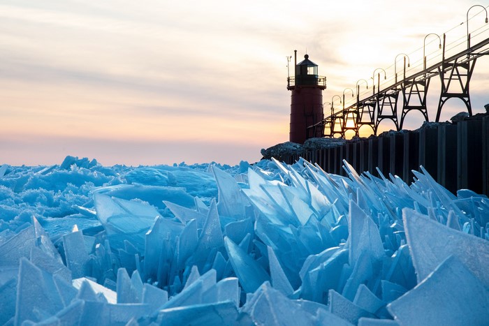 Frozen Lake Michigan at Sunset with Lighthouse