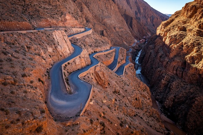 Winding mountain road through a rocky canyon