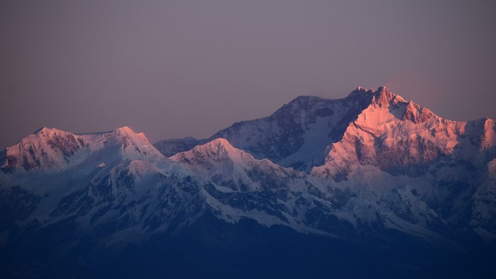Sunrise over snow-capped Kangchenjunga mountains