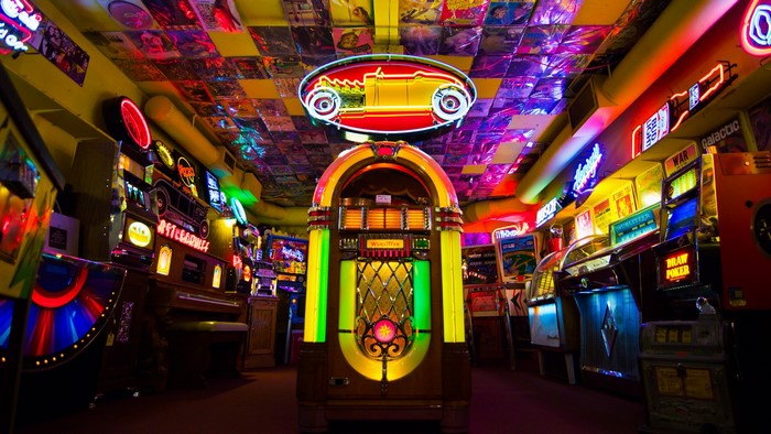 Retro arcade with jukebox and neon signs