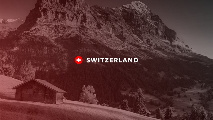 Switzerland flag and text over mountain landscape
