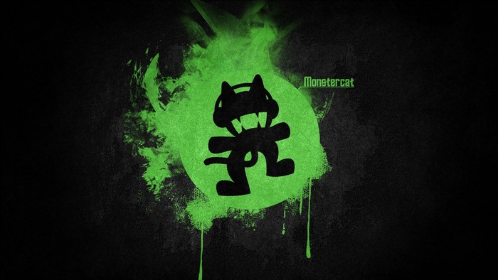 Monstercat logo with green paint splatter