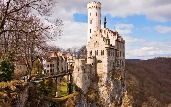 Schloss Lichtenstein castle on a cliff with trees