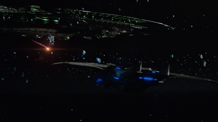 Spaceships in space with asteroids