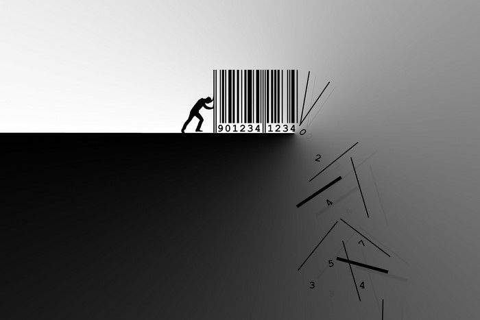Man pushing a barcode off a cliff