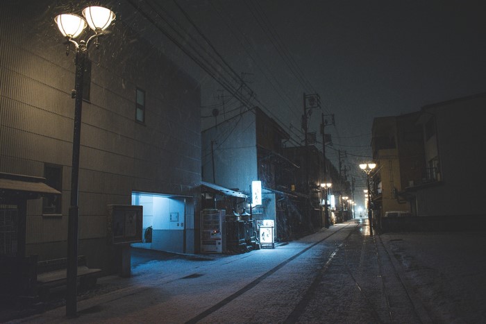 Snowy street at night in Japan