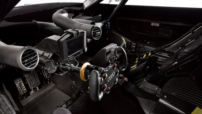 Audi DTM race car interior with carbon fiber steering wheel