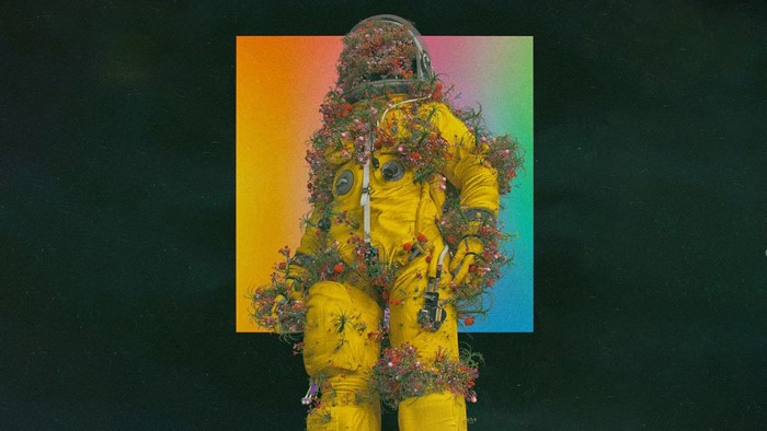 Astronaut covered in flowers with rainbow background